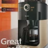 Philips HD7768/90 Grind & Brew Filter Kaffeemaschine, Mahlwerk, Timer, Champagner/schwarz